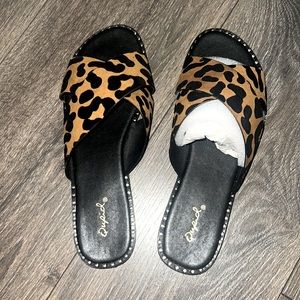 Leopard print slip on sandals
